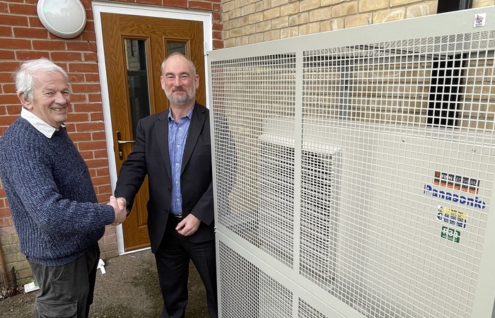 Cllr Gerald Kelly, West Suffolk Cabinet Member for the Environment and Guy Ransom, commercial director at Finn Geotherm next to an air source heat pump at one of the council's temporary accommodation sites, used to support people who are homeless. Cllr Gerald Kelly, West Suffolk Cabinet Member for the Environment and Guy Ransom, commercial director at Finn Geotherm next to an air source heat pump at one of the council's temporary accommodation sites, used to support people who are homeless.