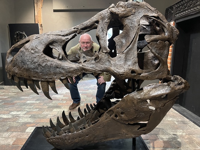 Cllr Ian Shipp looks through a T-Rex skull at Moyse's Hall Museum in Bury St Edmunds. The West Suffolk Council museum is preparing for its Prehistoric Beasts: Land, Sea and Sky exhibition which opens on 3 May 2025 Cllr Ian Shipp looks through a T-Rex skull at Moyse's Hall Museum in Bury St Edmunds. The West Suffolk Council museum is preparing for its Prehistoric Beasts: Land, Sea and Sky exhibition which opens on 3 May 2025